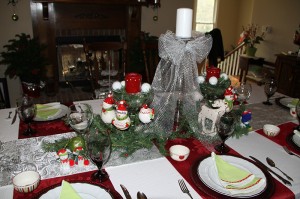 The green napkins lined in white created a Christmas tree when folded. Trimmed in red added a nice look when folded.