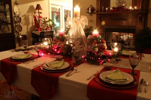 Soft lights on the tablescape created by weaving battery operated lights throughout the centerpiece.