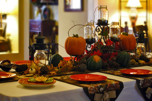 Fall Tablescape with all the pumpkins, vines, fruit jars, and beautiful colors of fall!